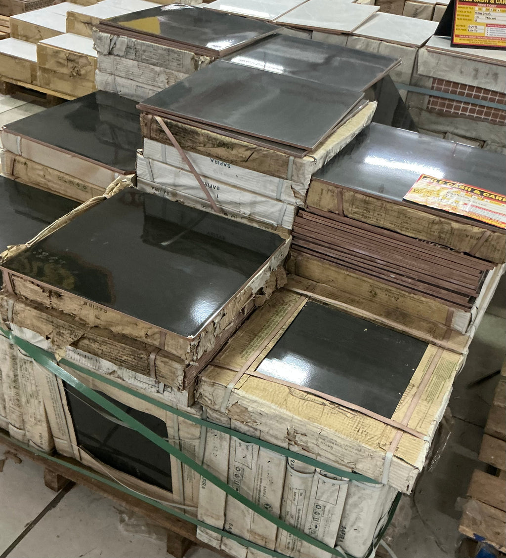 MQGB44101  SHINY BLACK C- GRADE SIZE 400 x 400 R49.95 M2 SOLD AS IS. ONE BOX COVERS 1.12 M2